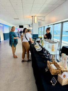 Employees enjoying hydration bar Orlando Corporate Wellness Experience